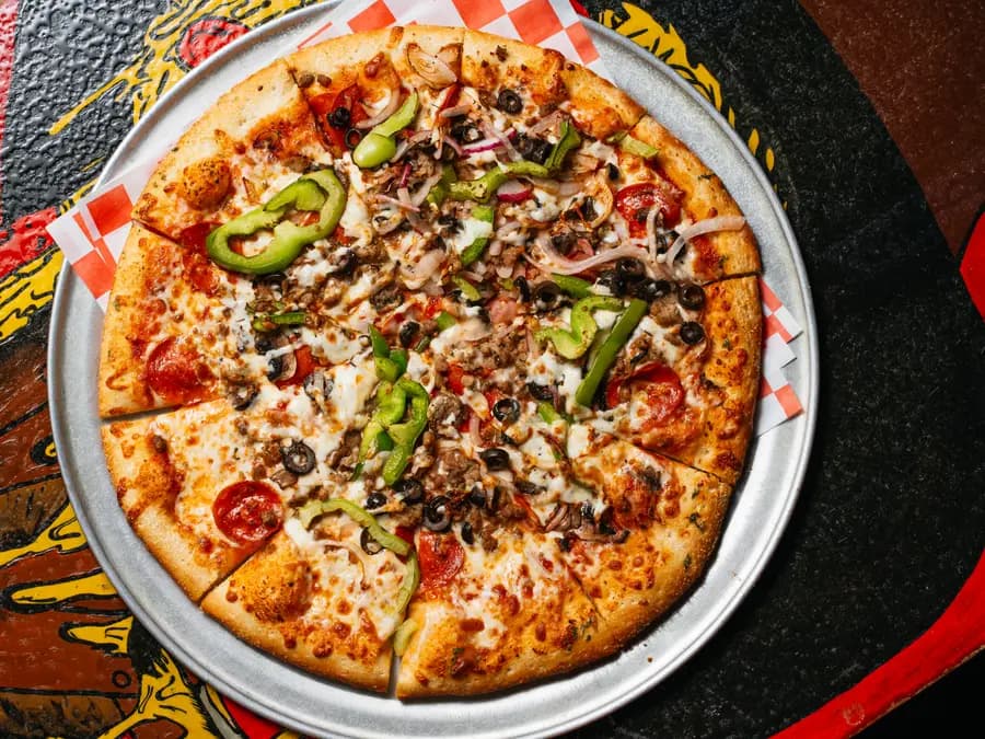 Supreme combo pizza loaded with meats and veggies